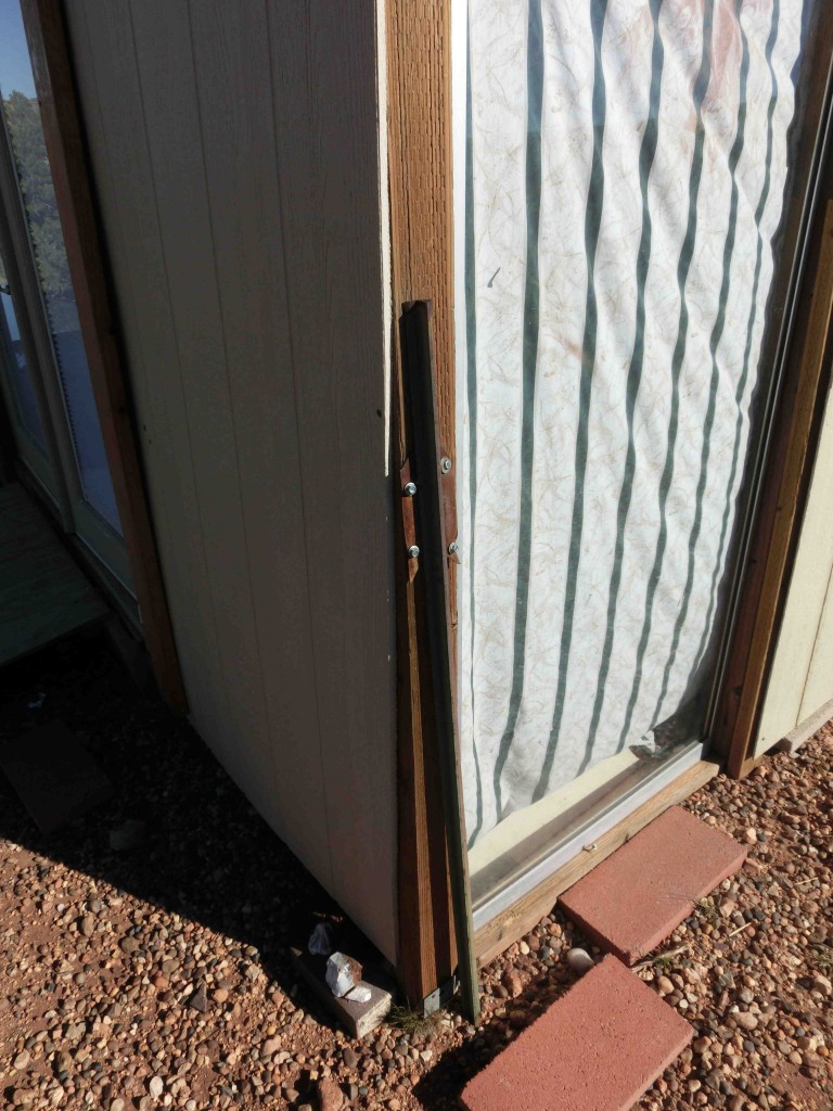 But credit where it's due - he did at least nod at the idea of fastening the cabin to the ground. Here and there are fence rails stuck in the ground upside-down and then screwed to the walls. I have no doubt that'll work.