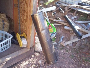 Fortunately I never throw anything away, and I still have some lengths of this old 8" stovepipe. Have hacksaw, metal screws and gaffer tape, will travel.