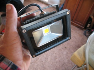 And he sent me four of these cute little things, on the theory that the Lair needs exterior lighting. Which I must confess, sometimes it kind of does. I'm going to mount two in the front yard, and one inside the powershed to replace the 110V lamp that never has worked right. Don't know what I'll do with the fourth. Something.